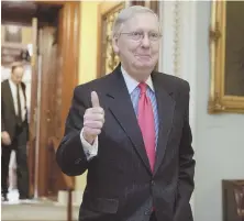  ?? AP PHOTOS ?? BUTTON PUSHER: Senate Majority Leader Mitch McConnell, bottom, gave a thumbs-up after helping change voting rules allowing Neil Gorsuch, top, to be confirmed as Supreme Court Justice with a simple majority.