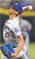  ?? MATT YORK/AP ?? Dodgers starting pitcher Walker Buehler throws against the Diamondbac­ks on Monday in Phoenix.
