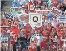  ?? SARAH PHIPPS/THE OKLAHOMAN ?? OU fans cheer during Monday’s WCWS semifinal against Stanford at USA Softball Hall of Fame Stadium.