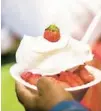  ?? PATRICK CONNOLLY/ ORLANDO SENTINEL ?? Strawberry shortcake is a staple of the Florida Strawberry Festival. In addition to a sold-out Willie Nelson concert, the event features concerts with Ludacris, Chris Young, the Pointer Sisters, Train and the Isley Brothers.