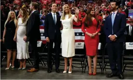  ??  ?? Tiffany Trump, Lara Trump and Eric Trump, Jared Kushner and Ivanka Trump, and Kimberly Guilfoyle and Donald Trump Jr watch as Donald Trump speaks in Orlando in June last year. Photograph: Evan Vucci/AP