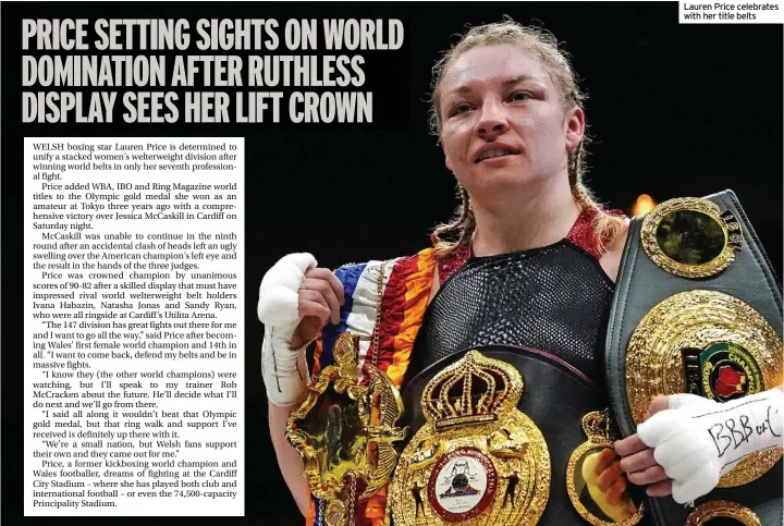  ?? ?? Lauren Price celebrates with her title belts