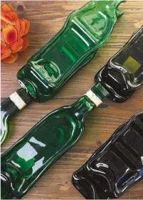  ??  ?? Attractive and eco-friendly pressed bottles turned into serving platters by Ysa's Crafts.