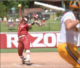  ?? Craven Whitlow/Special to News-Times ?? Throwing smoke: Razorback freshman pitcher Mary Haff fires a rising fastball against Wichita State to to record her fifth strikeout of the game. Haff picked up the win, pitching a one-hit shutout complete game. The Hogs won 5-0 and are in the winners...