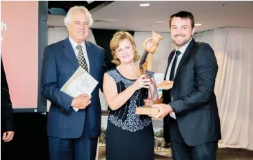  ?? Photo supplied ?? Emmanuel Nel from Kwandwe Signature Wildlife, right, receives his Young Rancher of the Year award from WRSA CEO Adri Kitshoff-Botha. Looking on is WRSA Game Rancher of the Year 2016 Arthur Rudman.