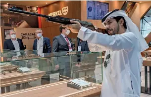  ?? — Photos by Ashwani Kumar ?? Three rifles with handmade engravings of Expo 2020 Dubai, Year of the 50th and the historic Al Maqta Tower are among the top attraction­s at the exhibition.