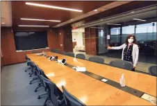  ?? Christian Abraham / Hearst Connecticu­t Media ?? Receptioni­st Julie Maimon shows a conference room in the new offices of financial-technology firm iCapital Network at 2 Greenwich Plaza in Greenwich on Sept. 23.