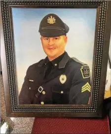  ?? SUBMITTED PHOTO ?? The official police portrait of Newtown Police Sgt. Clinton Cunningham.