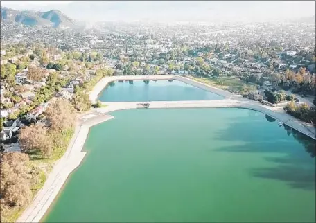  ?? KTLA ?? SILVER LAKE RESERVOIR has turned greenish in recent weeks. The DWP says it will treat the water for algae control if needed.