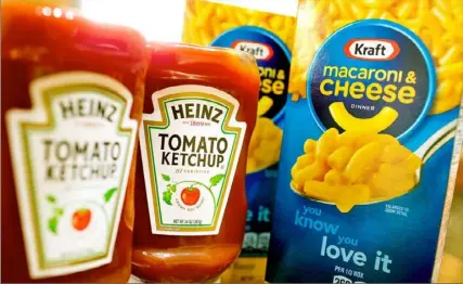  ?? Scott Olson/Getty Images ?? Heinz tomato ketchup and Kraft macaroni & cheese are just a couple of Kraft Heinz’s Co.’s well-known brands.