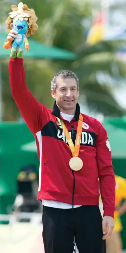  ??  ?? right
A gold medal for the TT at the Rio Paralympic­s
opposite top
On the podium at the 2020 paracyclin­g track world championsh­ips in Milton, Ont.
opposite bottom
The Chernove family enjoying time together at the Cranbrook Community Forest, B.C.