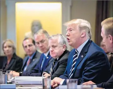  ?? Al Drago EPA/Shuttersto­ck ?? PRESIDENT TRUMP talks with his Cabinet about North Korea’s prisoner release. Experts disagree on how much upcoming nuclear talks with Kim Jong Un will be affected by Trump’s decision to quit the Iran pact.