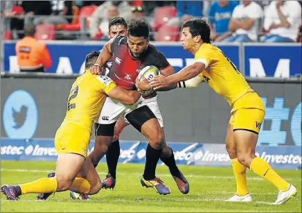  ?? Picture: MICHAEL SHEEHAN ?? HEAT ON: Southern Kings centre Berton Klaasen is tackled during his team’s Super Rugby match against the Jaguares at Nelson Mandela Bay Stadium