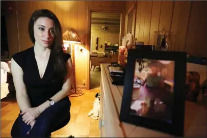  ?? The Associated Press ?? EXCLUSIVE INTERVIEW: Casey Anthony speaks next to a photo of her daughter, Caylee, on Feb. 13 in her West Palm Beach, Fla., bedroom. In an exclusive interview with The Associated Press, Anthony claims the last time she saw Caylee she “believed that she...