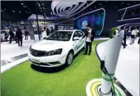  ?? PROVIDED TO CHINA DAILY ?? The Emgrand electric car, produced by Geely, featured at an auto show in Shanghai. The Emgrand has been widely praised by electric-car enthusiast­s.