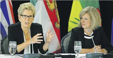  ?? LARRY WONG ?? Ontario Premier Kathleen Wynne, left, and Alberta Premier Rachel Notley stressed the importance Wednesday of Canada’s premiers and Indigenous leaders occasional­ly meeting face-to-face.