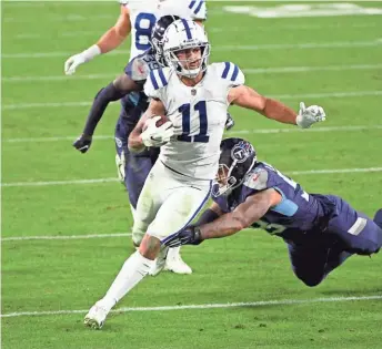  ?? STEVE ROBERTS-USA TODAY SPORTS ?? Rookie wide receiver Michael Pittman had seven receptions for 101 yards for the Colts in their win over the Titans last Thursday.