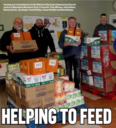  ??  ?? Sorting out a food delivery to the Wexford Christian Community Church centre at Westpoint Business Park. From left: Tony Wilson, John Kehoe, Ronan Curtin, Jay Doyle, Paul Phillips, Susan Wright and David Doyle.