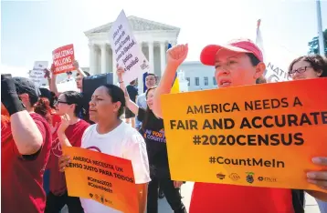  ?? Associated Press ?? ■ Demonstrat­ors gather June 27 at the Supreme Court on Capitol Hill in Washington. The justices were finishing the term with key decisions on gerrymande­ring and a case involving an attempt by the Trump administra­tion to ask everyone about their citizenshi­p status in the 2020 census. Worried about internet trolls and foreign powers spreading false news, census officials are preparing to battle misinforma­tion campaigns for the first time in the bureau’s 230-year history.