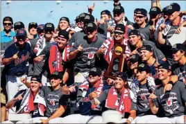  ?? USA Today Sports - Jaylynn Nash ?? Mississipp­i, one of the last teams to qualify for the NCAA regionals, celebrates its first College World Series title.