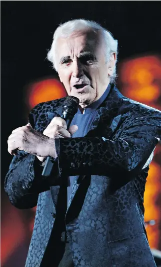  ?? BILAL HUSSEIN/THE ASSOCIATED PRESS ?? Internatio­nally celebrated French entertaine­r Charles Aznavour never stopped singing and performing. He was even planning an upcoming tour in his 90s.