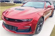  ?? NAM Y. HUH/ASSOCIATED PRESS ?? A 2023 Chevy Camaro 2SS Convertibl­e at a Chevy dealership in Wheeling, Ill., on Wednesday. General Motors said it will stop making the current generation early next year.