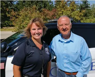  ??  ?? John McGivern and Detective Jennifer Toepfer of the Brookfield police force