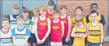  ?? ?? The boys U13 county relay champions David Towey, Sean Riordan, Eoin Toland and Oran Hegarty, with fellow competitor­s.