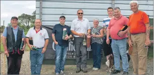  ??  ?? Anna Morrison presents the prizes to the winners of the Glenfiddic­h Challenge Trophy shoot at the Glendaruel and Colintraiv­e Gun Club. L to R – Alan Brown, Paul Chalmers, Gordon Griffiths, John Gilchrist, Anna Morrison, Archie McBride, Stewart MacNeill...
