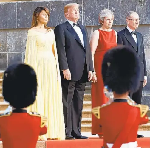  ?? GETTY ?? Trump and First Lady Melania Trump join British Prime Minister Theresa May and her husband Philip May at Blenheim Palace, north of London.