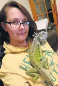  ??  ?? ●● Frank the iguana ‘came back to life’ after his owner, Larissa Palmieri, thought he was dead