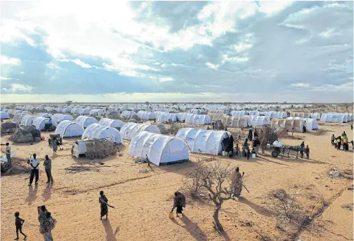  ??  ?? TAKING SHELTER: The Dadaab refugee camp, the world’s largest, in Kenya is home to many Somali refugees. Its initial closure date has been extended.