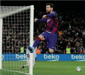  ?? (Reuters) ?? In this March 7, 2020, picture, Barcelona’s Lionel Messi celebrates after scoring a goal during the La Liga match against Santander at Camp Nou in Barcelona, Spain.