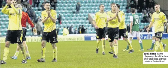  ??  ?? Hibernian ............. 2 St Mirren............... 3
Well done Saints players applaud the fans after grabbing all three points at Easter Road