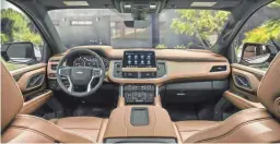  ?? GENERAL MOTORS ?? The inside of the 2021 Chevy Suburban with a touchscree­n in the front dashboard.