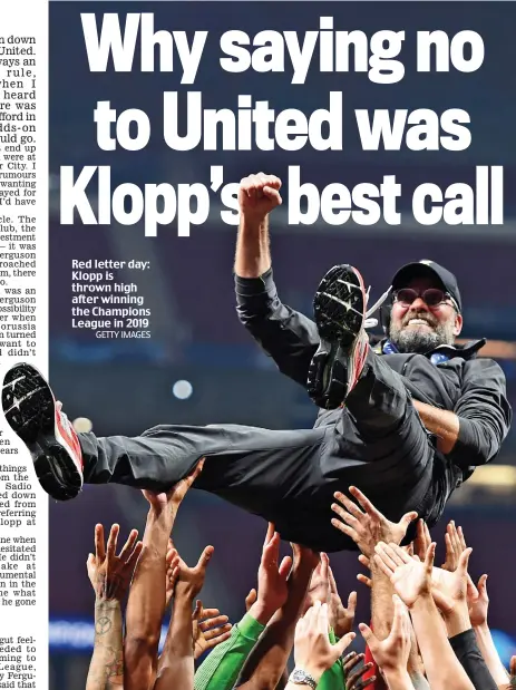  ?? GETTY IMAGES ?? Red letter day: Klopp is thrown high after winning the Champions League in 2019