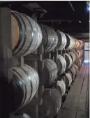  ?? Associated Press ?? Bourbon ages in barrels at the Jim Beam distillery in Clermont, Ky.