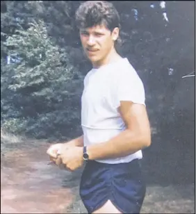  ??  ?? Tim Delaney race in 1985. takes a break after completing the Cobequid Run 10 kilometre