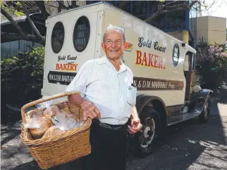  ?? ?? Harvey Marrable – pictured with an original delivery van – and his wife, Dulcie, started Gold Coast Bakeries in 1956. The business has been sold. Picture: David Clark