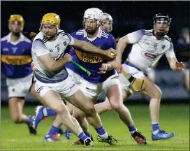  ?? ?? ESCAPE: Podge Delaney of Laois gets away from Tipperary’s Michael Breen