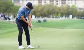  ?? Steve Dykes / Getty Images ?? Jordan Spieth putts on the 17th green during the final round of Valero Texas Open at TPC San Antonio on Sunday.