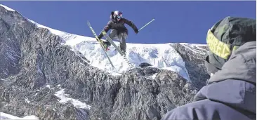  ?? JOHN LEICESTER / ASSOCIATED PRESS ?? A skier trains in October on the glacier above Saas-Fee, Switzerlan­d, which drew many nations’ skiers and snowboarde­rs seeking snow on which to train early in the season before the 2018 Winter Olympics.