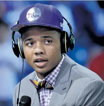  ?? FRANK FRANKLIN/AP ?? Markelle Fultz answers questions during an interview after being selected by the Philadelph­ia 76ers as the No. 1 pick overall during Thursday’s NBA draft in New York.
