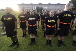  ?? SEAN RAYFORD — THE ASSOCIATED PRESS FILE ?? Students in the new Army prep course stand at attention after physical training exercises at Fort Jackson in Columbia, S.C., Aug. 27, 2022.