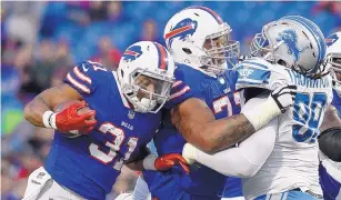  ?? AP FILE ?? Left tackle Cordy Glenn (77) was traded by the Buffalo Bills to the Bengals Monday.