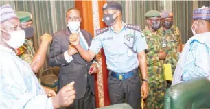  ?? Photo: Felix Onigbinde ?? From right; Minister of Defence, Maj Gen Bashir Magashi rtd, Chief of Air Staff, Air MArshal Isiaka Oladayo Amao, Chief of Defence Staff, Maj. Gen. Lucky E Irabor, Inspector General of Police Muhammed Adamu, National Security Adviser Maj
Gen Babagana Mongonu rtd, Chief of Army Staff, Maj Gen Ibrahim Attahiru and Director General of DSS, Yusuf Bichi Magaji during the National Security Council meeting held at the presidenti­al villa Abuja yesterday