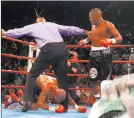  ??  ?? Mayweather defeats Diego Corrales in 2001 to win the WBC super featherwei­ght championsh­ip.