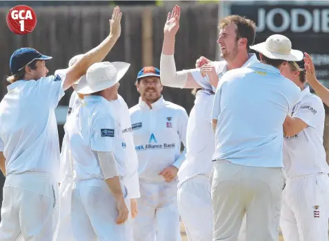  ?? Pictures: MARK WILSON ?? GOT HIM: East Belmont quick Alex Willerton and his teammates celebrate the wicket of Lara captain Daniel Weigl.