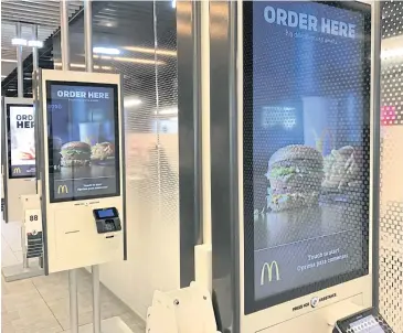  ?? REUTERS ?? McDonald’s self-service kiosks are seen in a prototype restaurant housed in a warehouse in Chicago’s West Loop area on March 1, 2017.