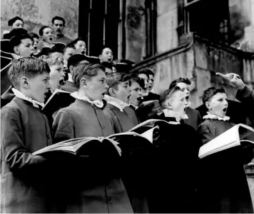  ?? ?? Above: Boys in the coronation choir rehearsing in May 1953 at Addington Palace, near Croydon. Facing page: The youngest of the choristers, Henry Roger Dormer, of Armagh